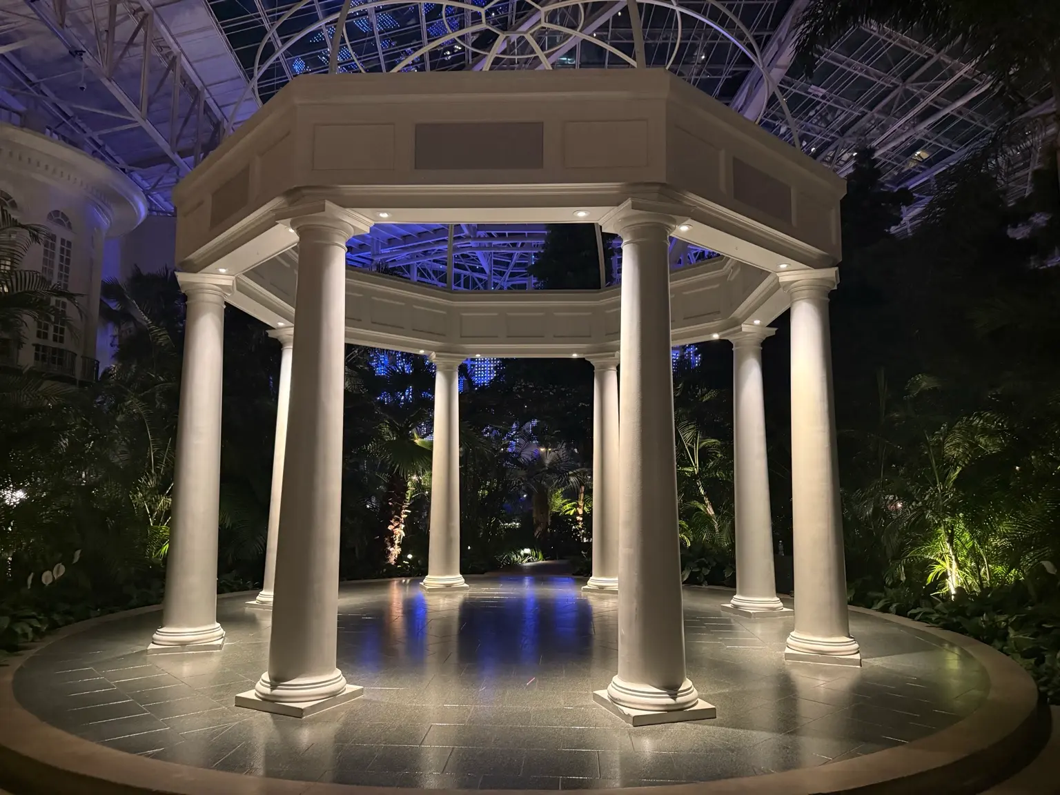 Commercial architectural column uplighting with landscape lighting and controlled walkway illumination