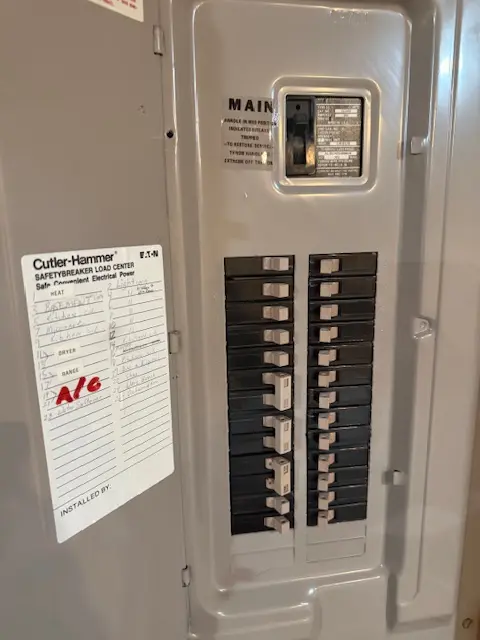 Main breaker panel feeding a lighting transformer and affecting voltage stability flicker control and dimming quality