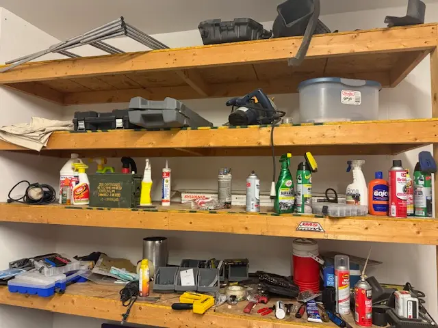 Philip Meyer's technical lighting workshop showing organized components, tools, and specialty agents for safe electrical troubleshooting